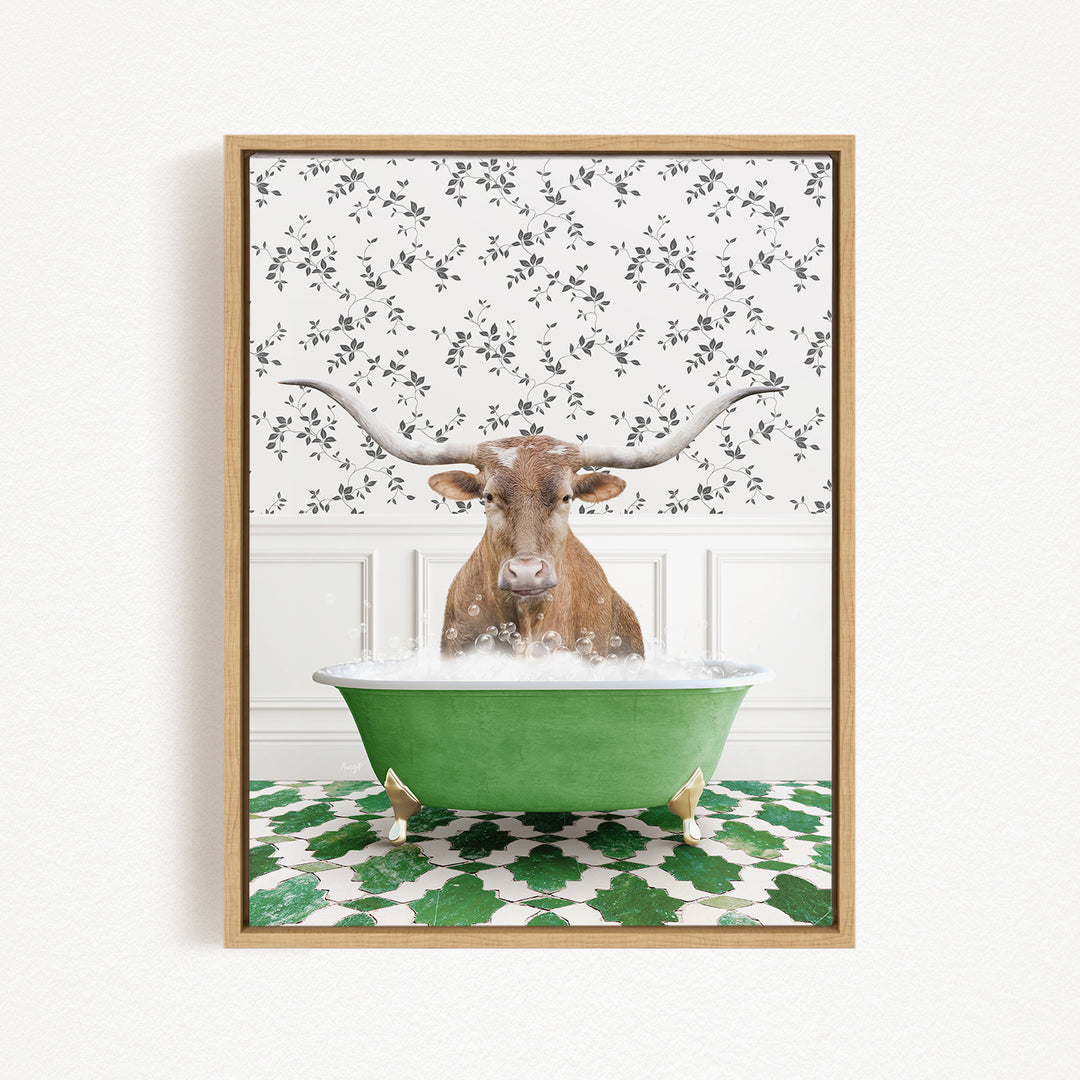A brown cow with large horns is sitting in a green bathtub filled with water, surrounded by a patterned wall and green and white tiles.