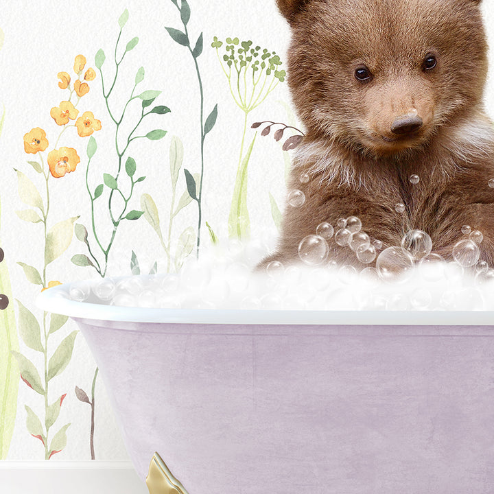 a brown bear sitting in a bath tub filled with bubbles