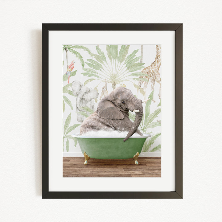 A framed image depicting a gray elephant sitting in a green bathtub, surrounded by a tropical jungle scene with a giraffe and other animals.