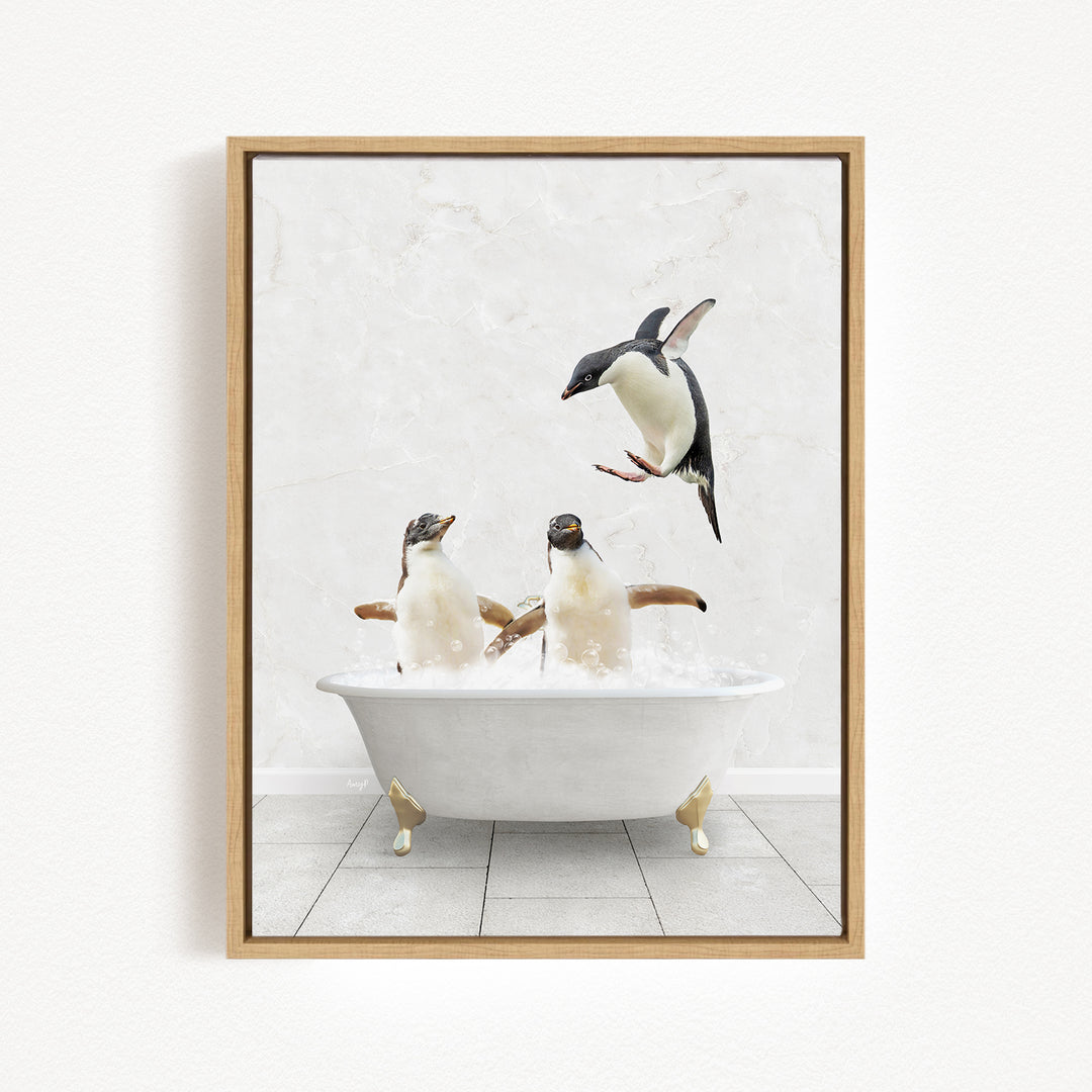 A framed image depicting two penguins sitting in a bathtub, with one penguin flying towards the other penguin.