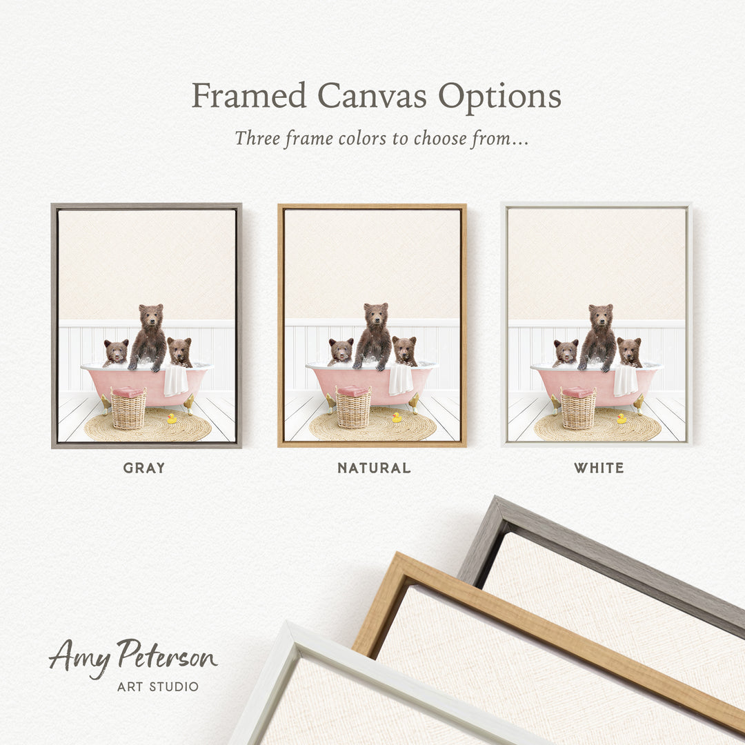 three framed canvas options, each featuring a bear cub in a bathtub. The options include a gray frame, a natural frame, and a white frame. The bears are sitting in the bathtub, and the bathtub is placed on a rug.