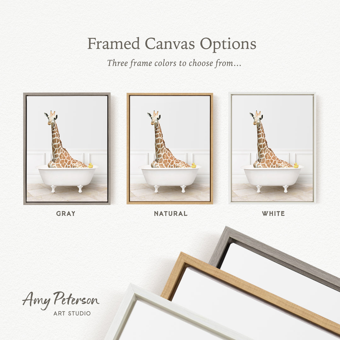 three framed canvas options, each featuring a giraffe sitting in a bathtub. The options include a gray frame, a natural frame, and a white frame.