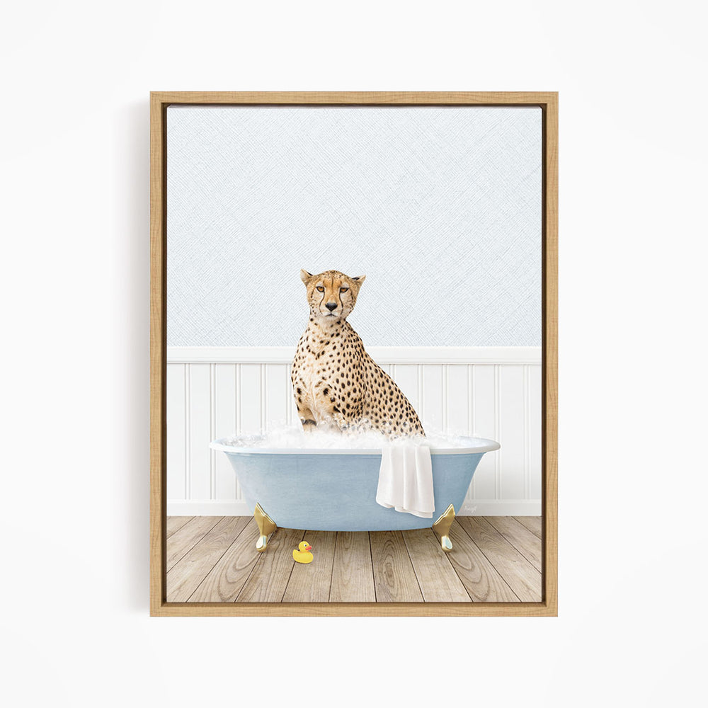 A cheetah sitting in a blue bathtub filled with water, surrounded by rubber ducks.