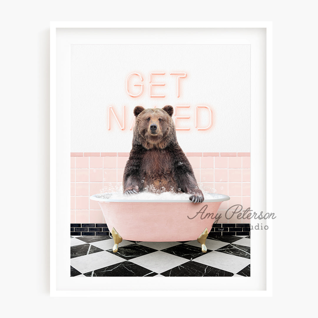 a brown bear sitting in a pink bath tub