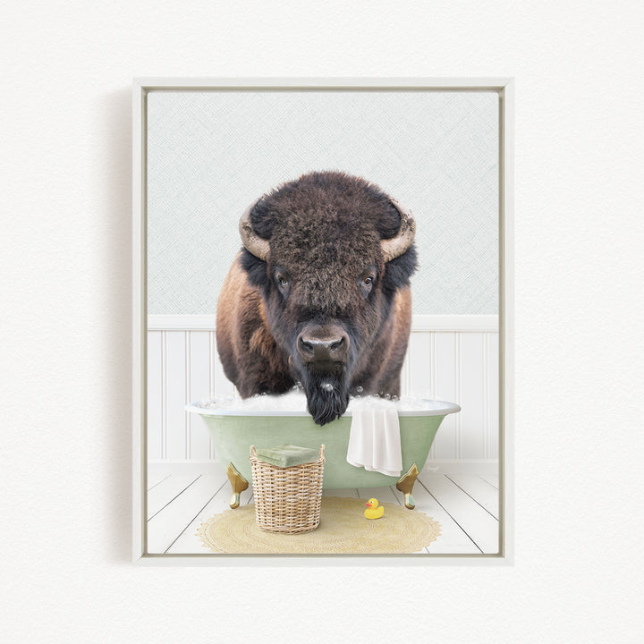 A buffalo with a long beard is standing in a green bathtub filled with water, surrounded by rubber ducks and a basket.