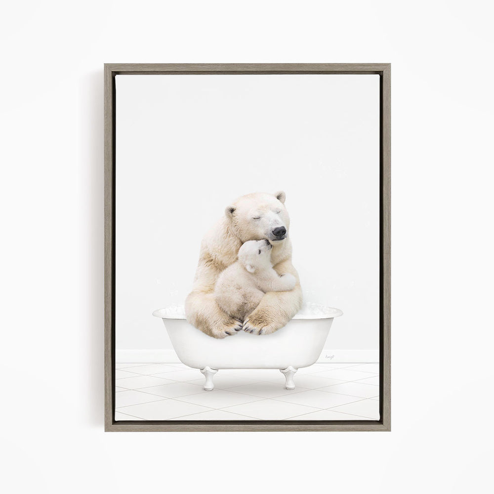 A mother polar bear and her cub sitting together in a white bathtub.
