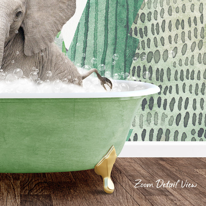 A large elephant is sitting in a green bathtub filled with bubbles, creating a whimsical and playful scene.
