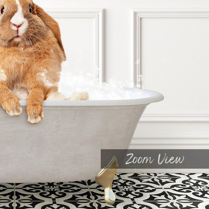 A cute orange rabbit sitting in a white bathtub filled with bubbles, with a black and white patterned floor in the background.