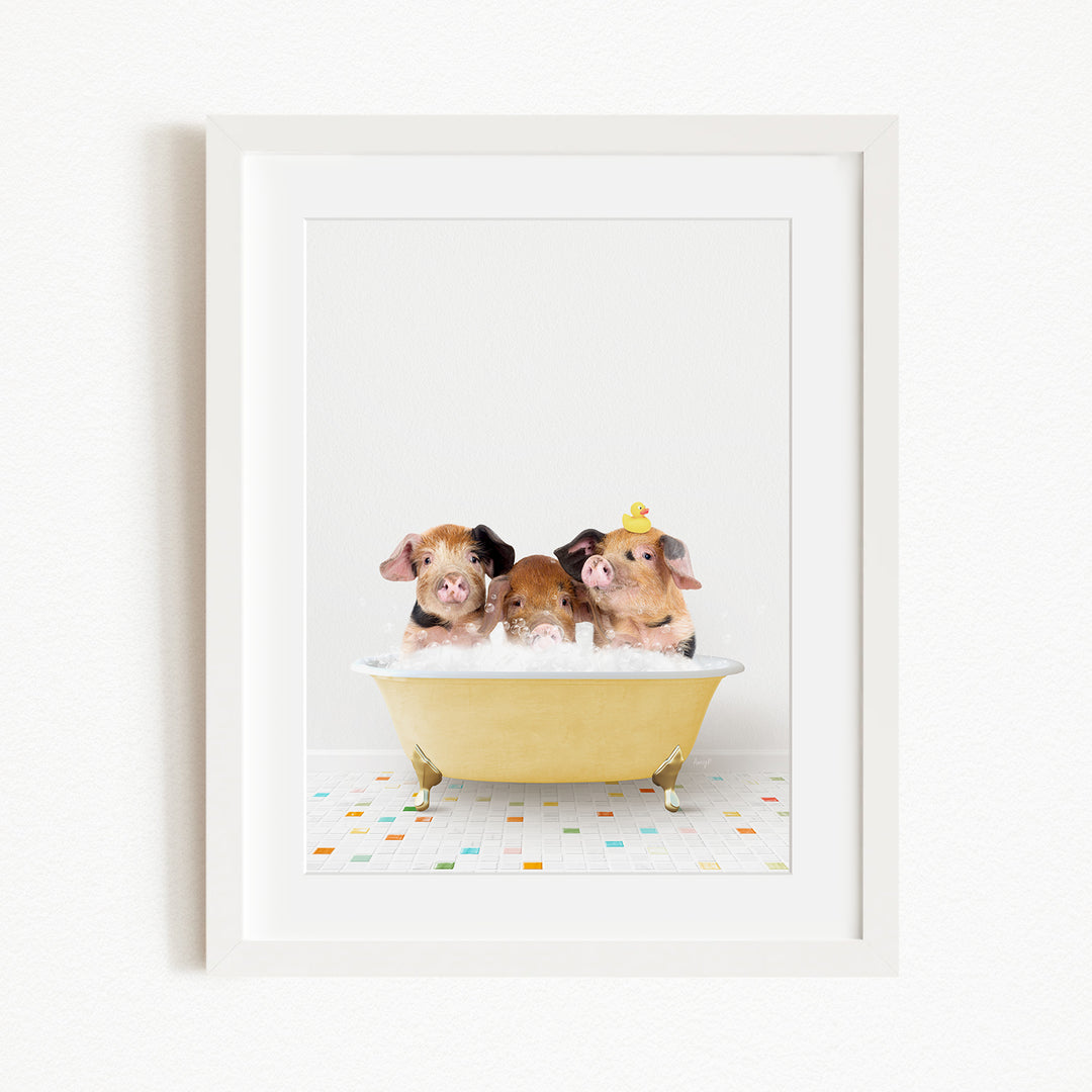 Three adorable pigs sitting in a yellow bathtub, with one of them wearing a yellow hat.