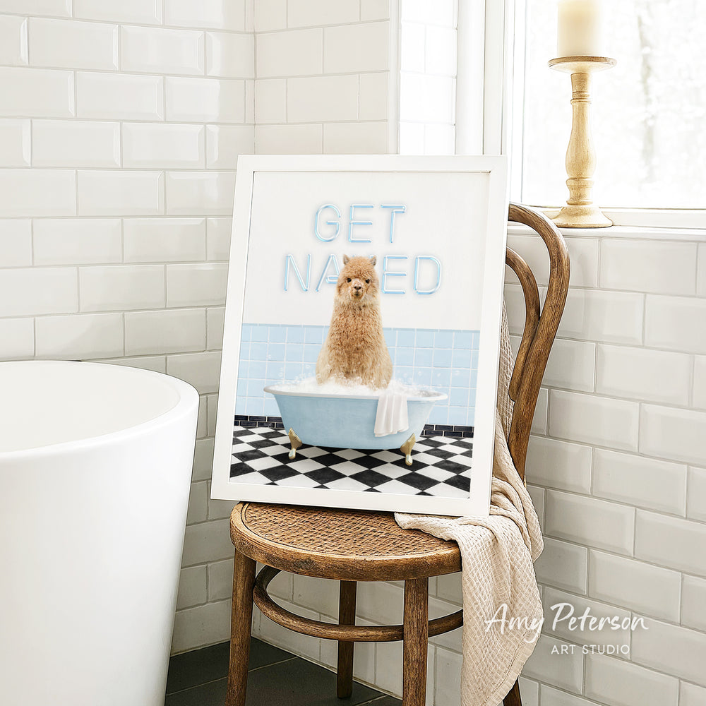 A framed image of a dog sitting in a bathtub, with the text "GET NAUNTED" displayed on the frame.