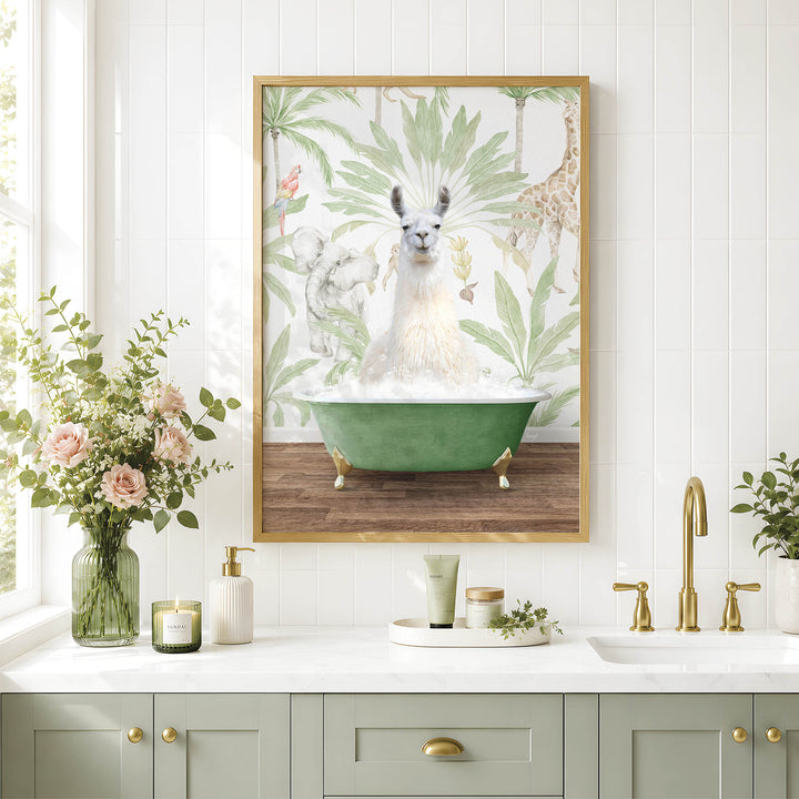 A framed image of a white llama sitting in a green bathtub, surrounded by a tropical plant and flowers, is displayed on a white tiled wall above a white countertop with various bathroom accessories.