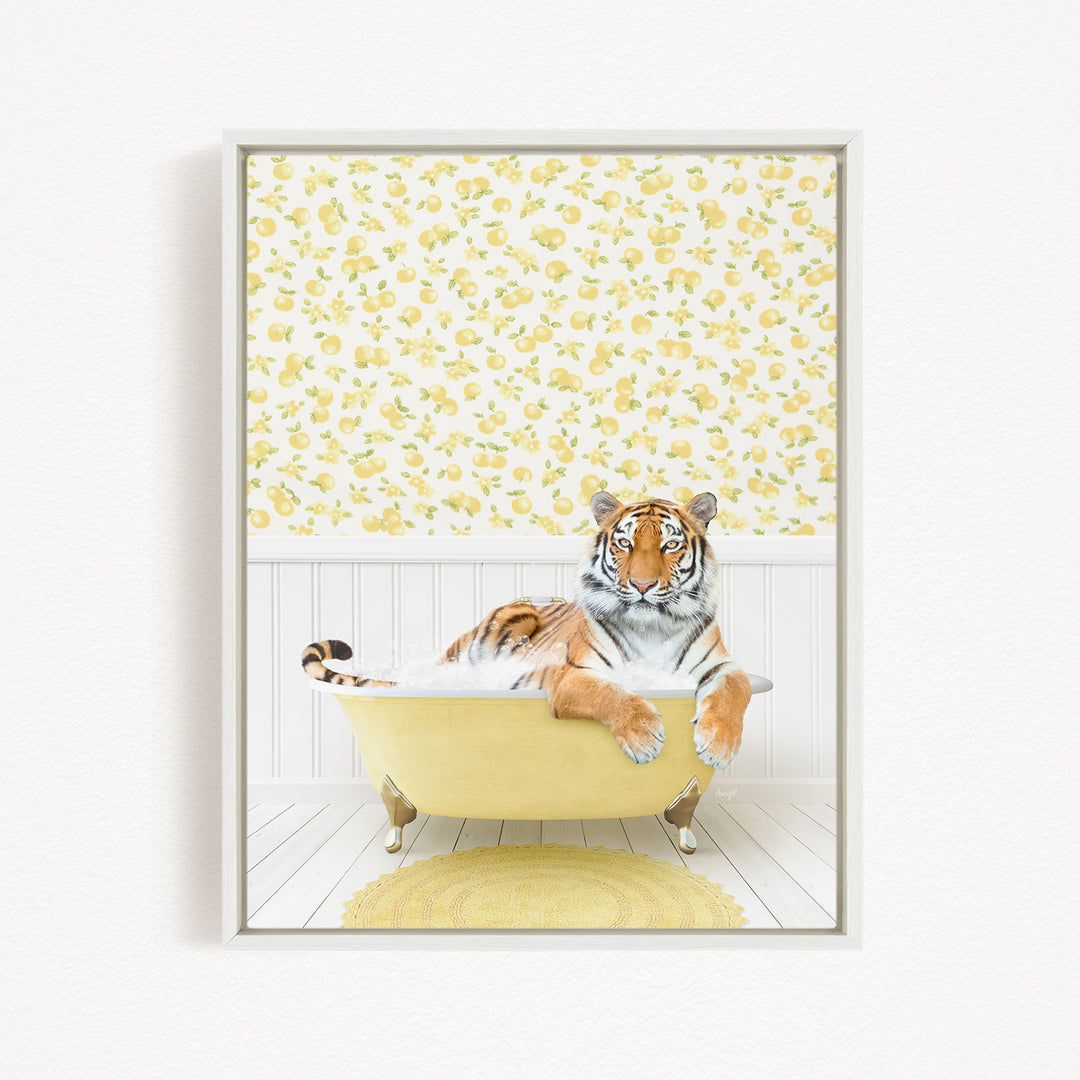 A tiger is sitting in a yellow bathtub, surrounded by a yellow and white floral patterned wall.