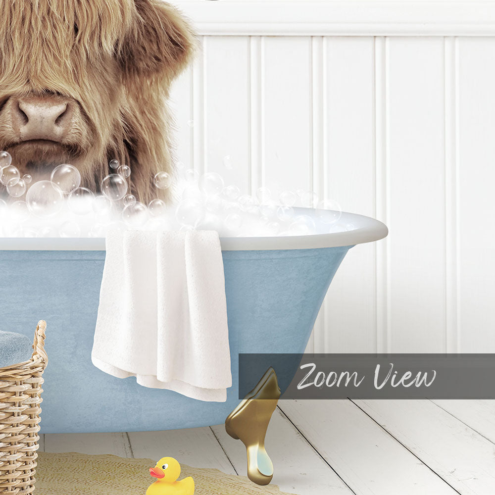 A large, shaggy-haired dog is sitting in a blue bathtub filled with bubbles, surrounded by a yellow rubber duck and a white towel.