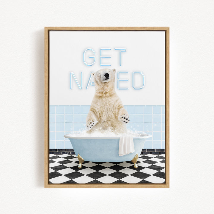 A polar bear sitting in a bathtub with the words "GET NANED" written on the wall behind it.