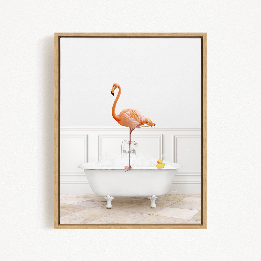 A flamingo standing on the edge of a white bathtub filled with water, with a rubber duck floating in the water.
