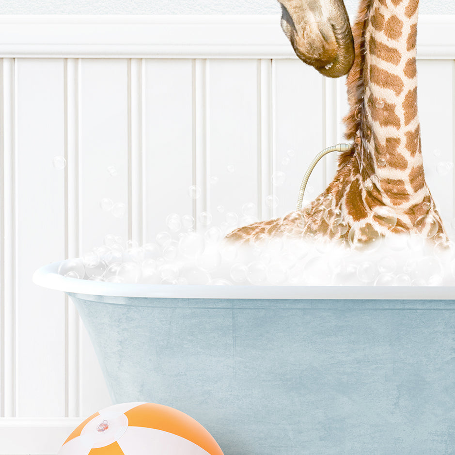 a baby giraffe in a bath tub with bubbles