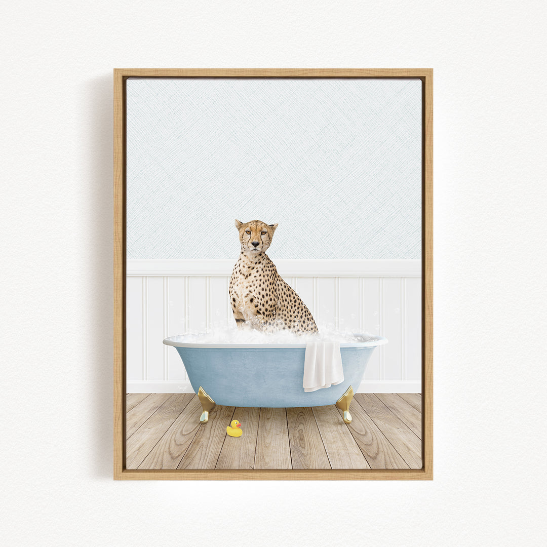 A cheetah sitting in a blue bathtub filled with water, surrounded by rubber ducks.