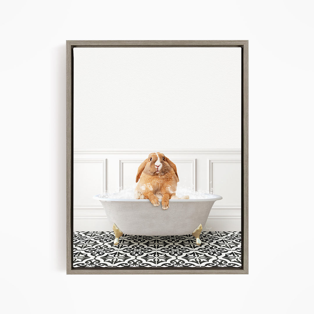 A brown rabbit sitting in a white bathtub filled with water, surrounded by a black and white patterned floor.
