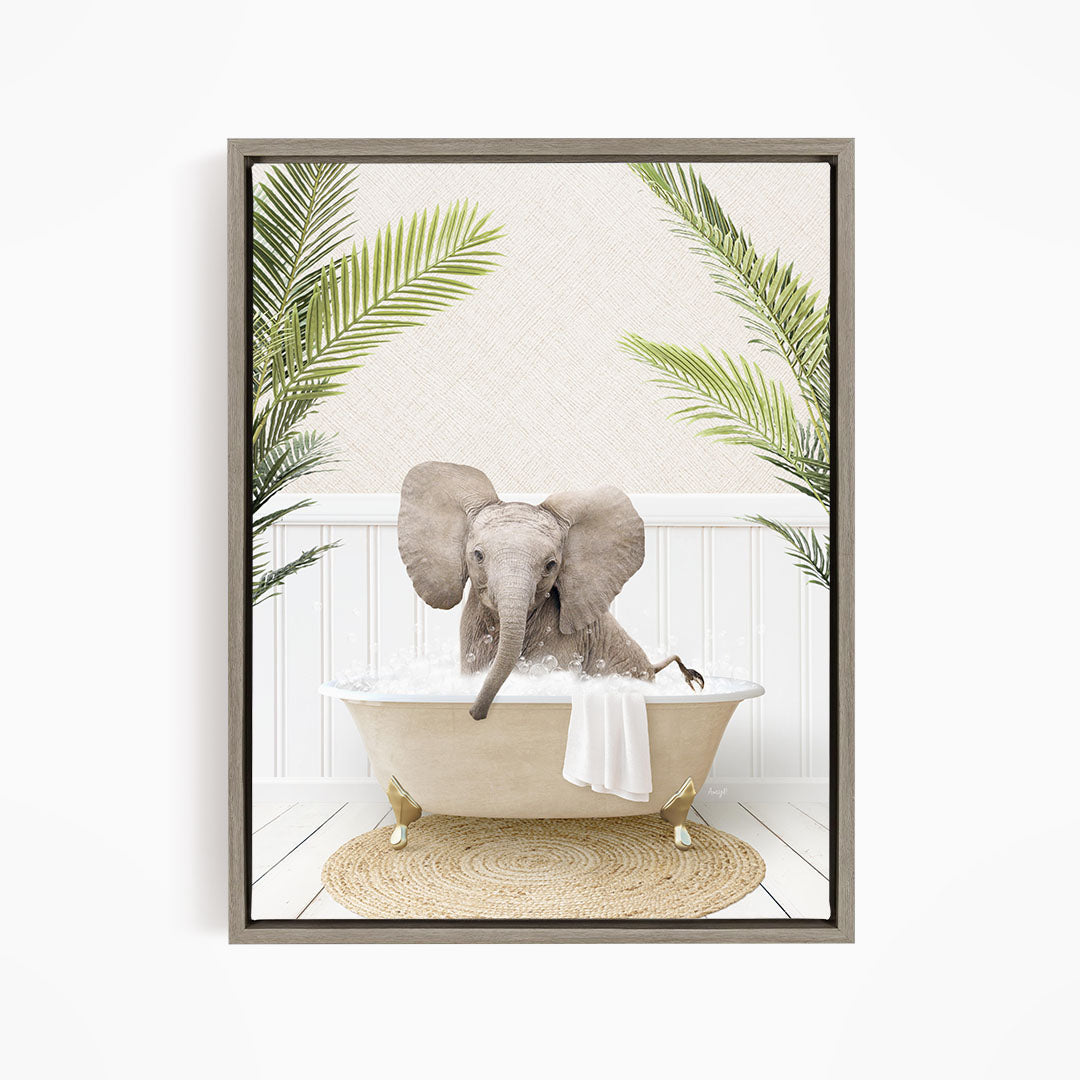A gray elephant is sitting in a white bathtub filled with water, surrounded by green palm leaves.