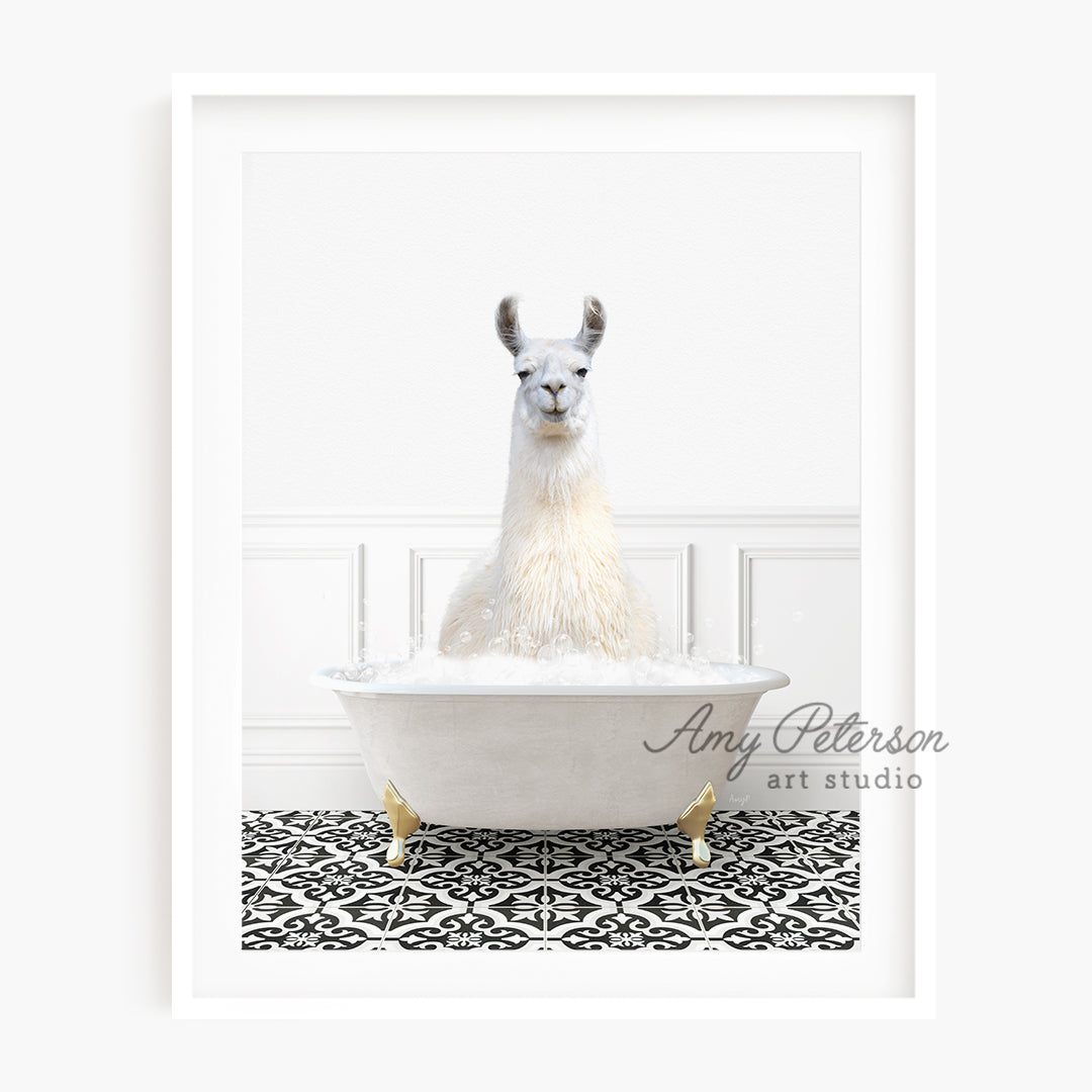 a llama sitting in a bathtub with foam on it