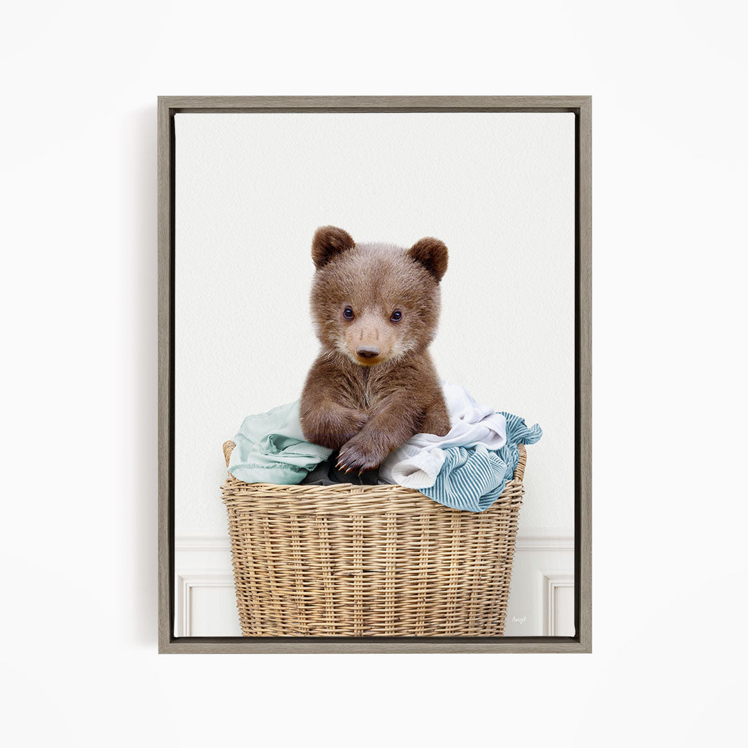 Baby Bear in Laundry Basket - Simple White Wall