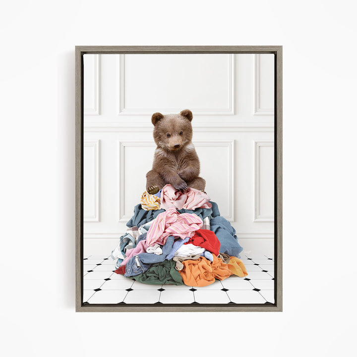 Bear Cub Sitting On Clothes Pile - Classic White Floor