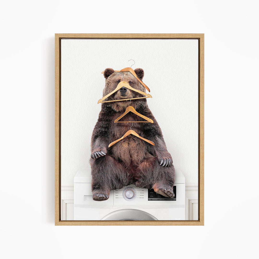 Bear Wearing Clothes Hangers on Washing Machine - Simple White Wall