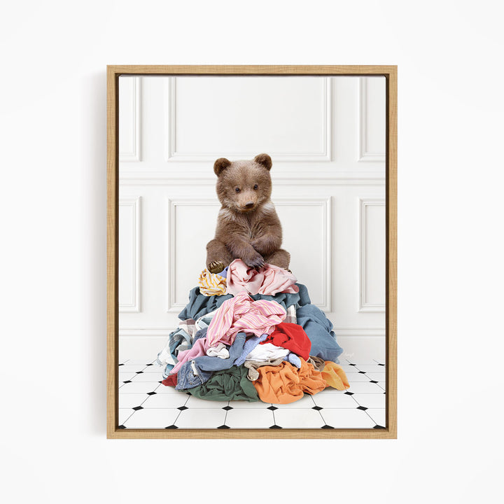 Bear Cub Sitting On Clothes Pile - Classic White Floor