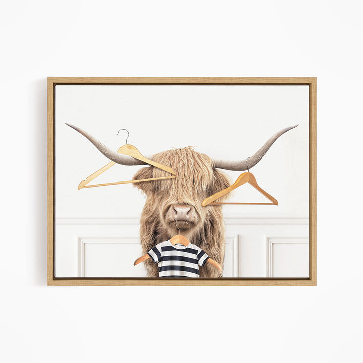 Highland Cow with Clothes Hangers - Simple White Wall