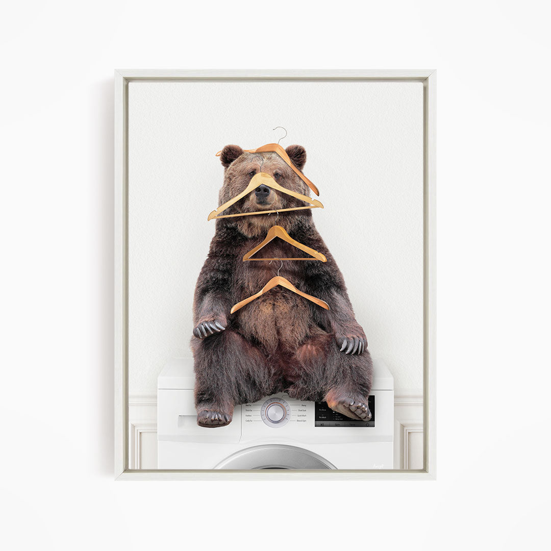 Bear Wearing Clothes Hangers on Washing Machine - Simple White Wall