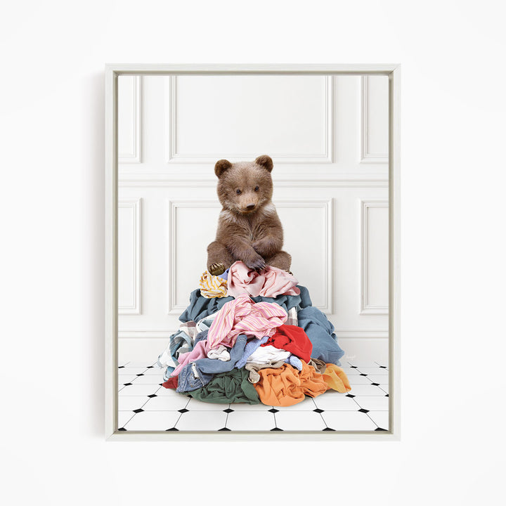 Bear Cub Sitting On Clothes Pile - Classic White Floor