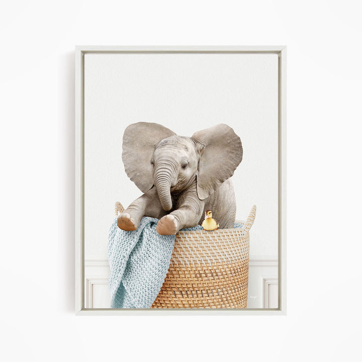 Baby Elephant in Laundry Basket - Simple White Wall