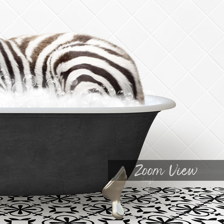 A zebra lying in a bathtub filled with bubbles, surrounded by a patterned tile floor.