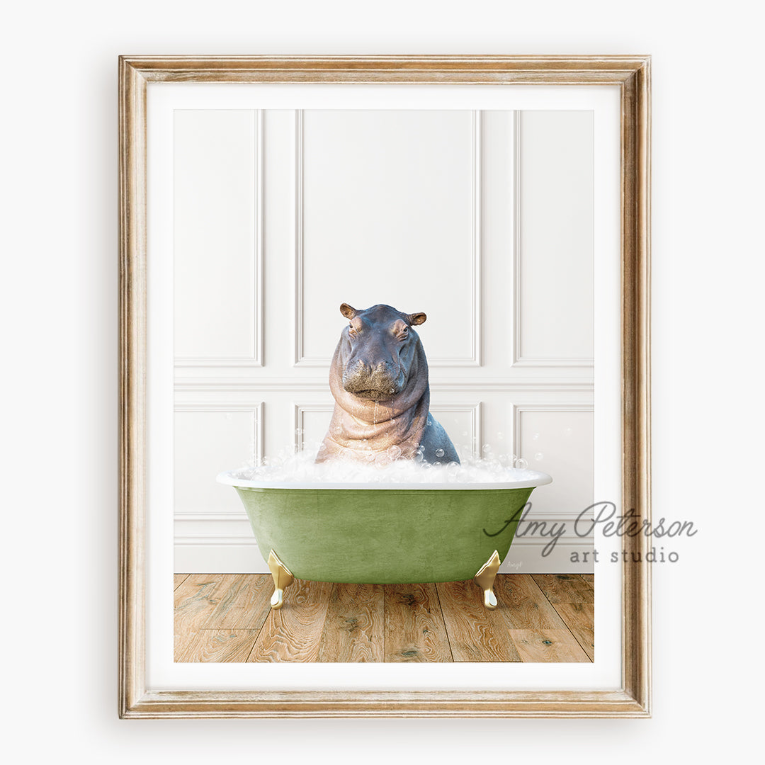 a hippo sitting in a green bath tub