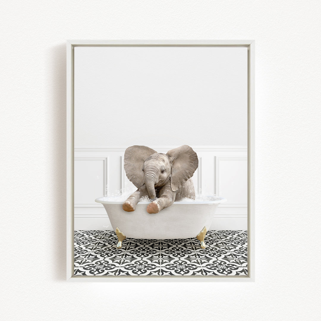 A baby elephant sitting in a white bathtub, surrounded by a black and white patterned floor.