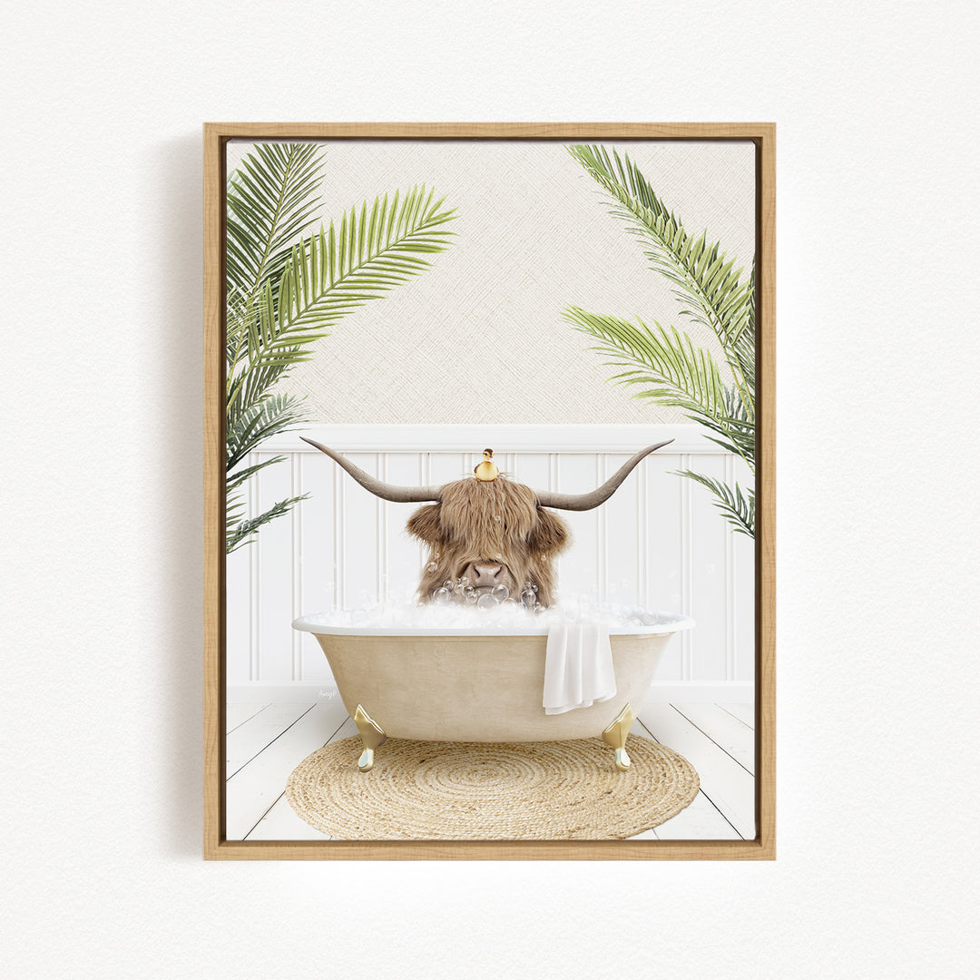 A cow with long horns is sitting in a bathtub filled with water, surrounded by palm leaves.