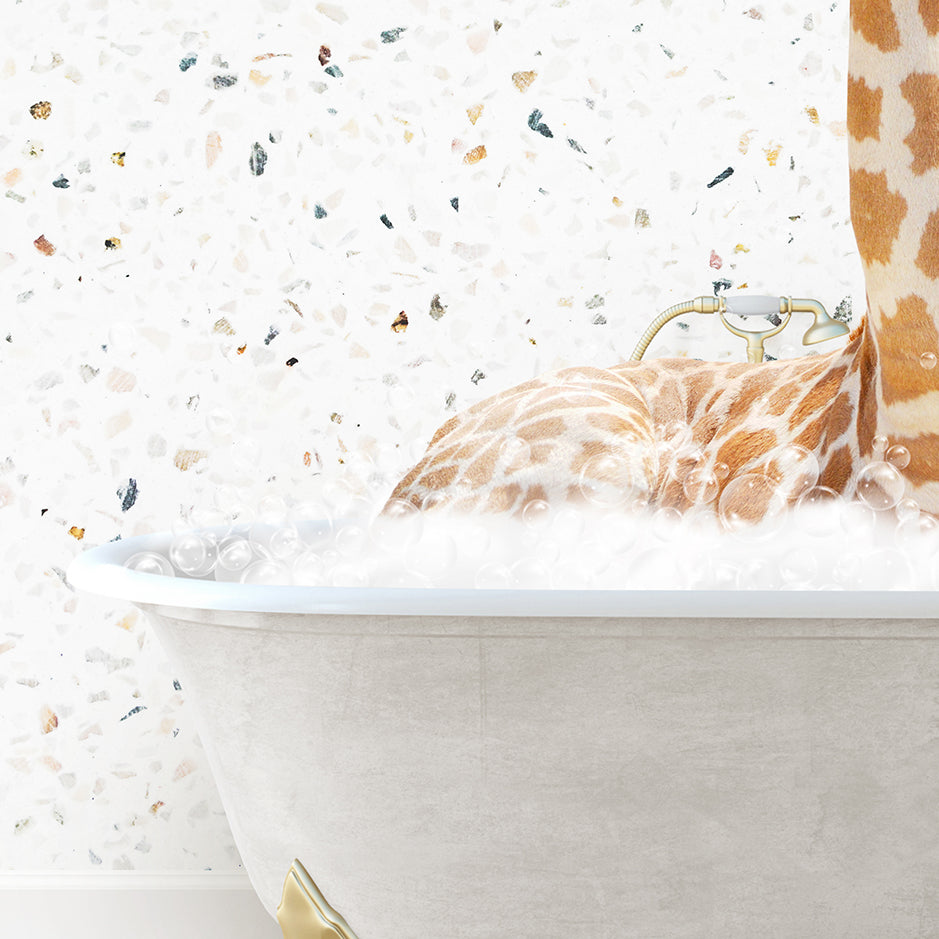 a giraffe laying in a bathtub with its head in the bathtub