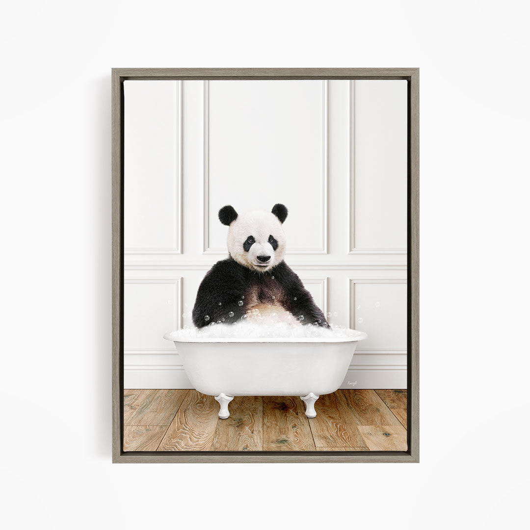 A panda bear sitting in a white bathtub filled with bubbles, creating a whimsical and playful scene.
