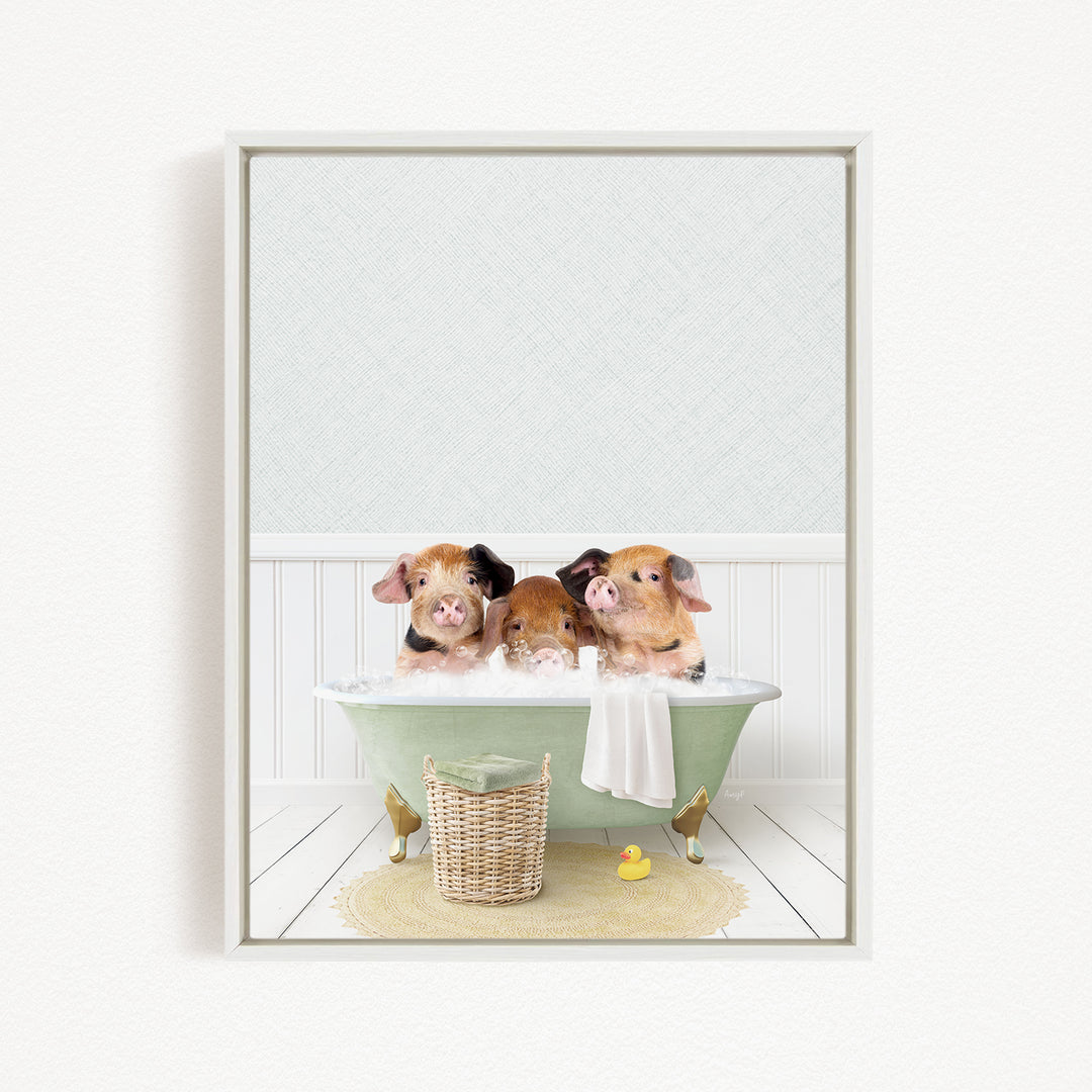 Three adorable pigs sitting in a green bathtub, with a basket of rubber ducks nearby.