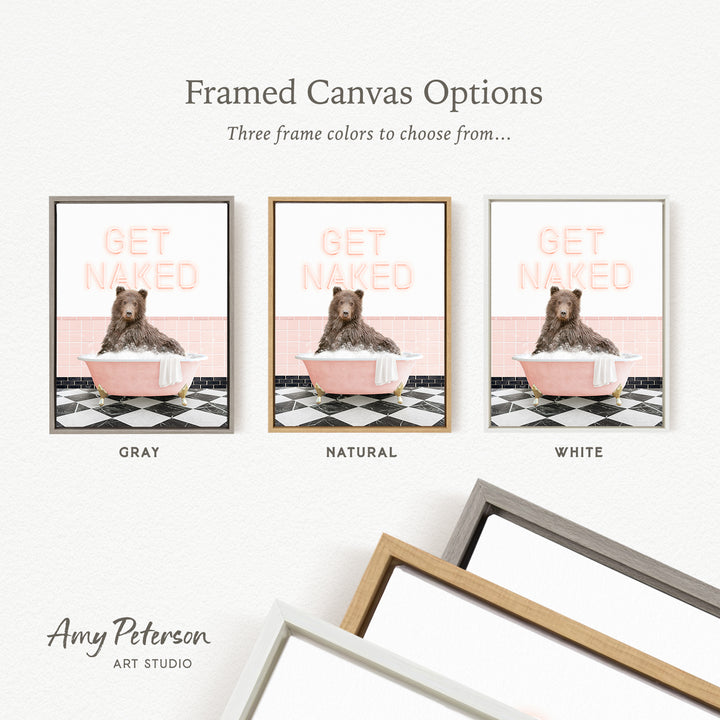 three framed canvas options featuring a bear sitting in a bathtub. The options include a gray frame, a natural frame, and a white frame.
