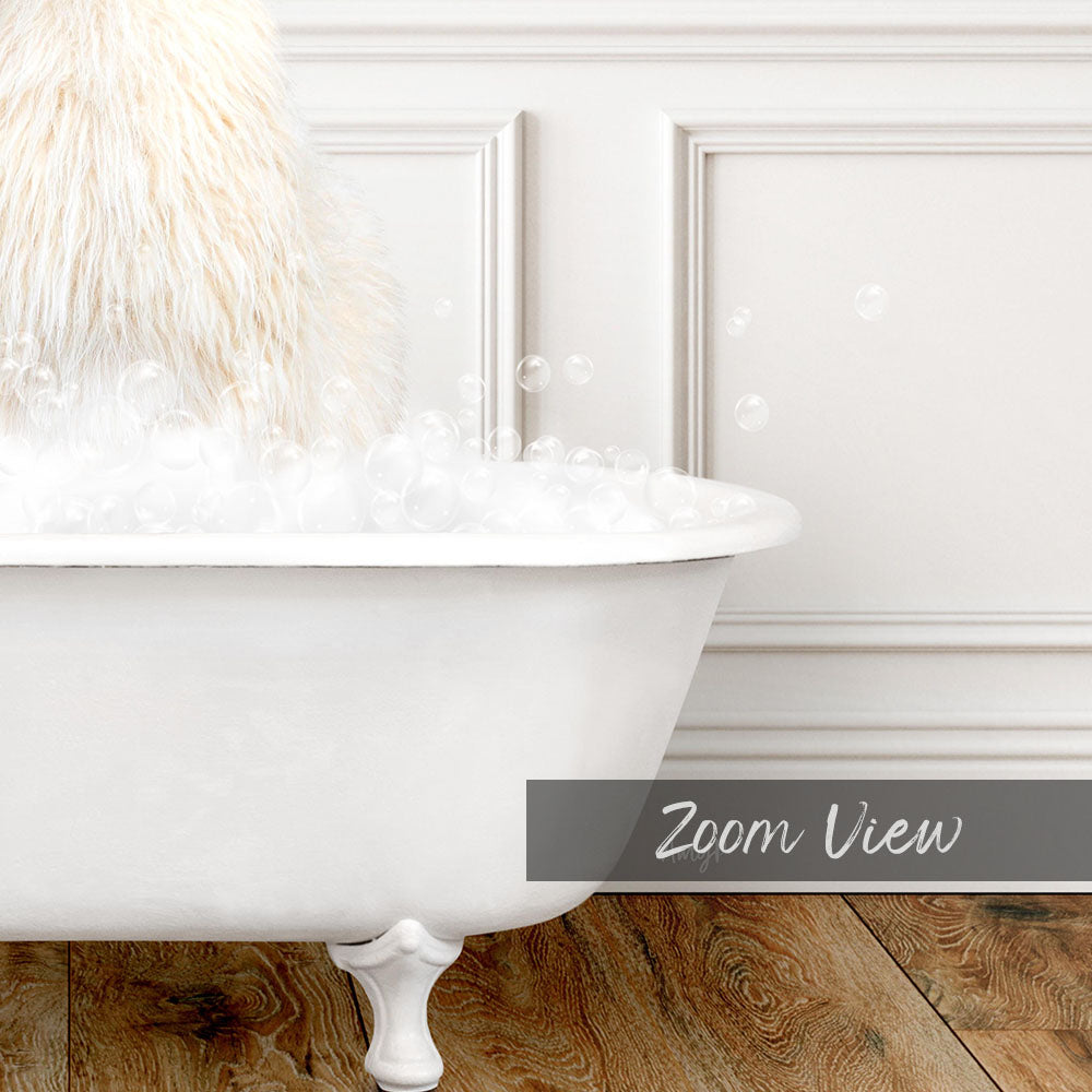A white bathtub filled with bubbles, with a fluffy white object sitting inside the tub.