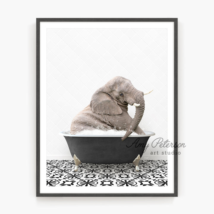 a picture of a baby elephant in a bathtub