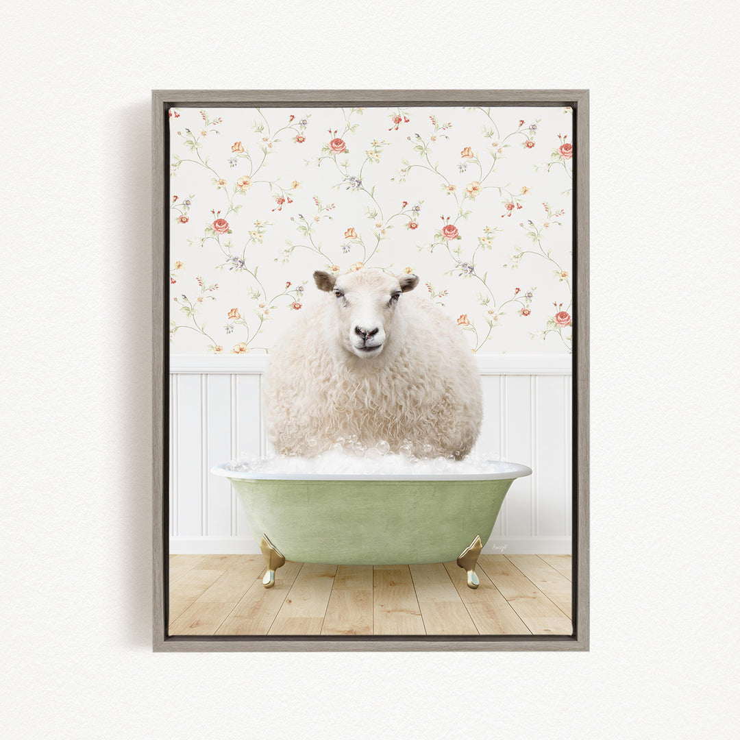 A fluffy white sheep sits in a green bathtub, surrounded by a floral wallpaper.