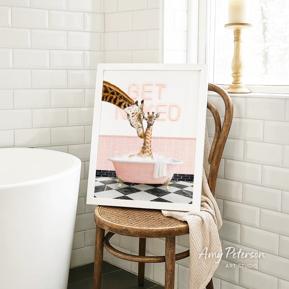 A framed image of two giraffes in a pink bathtub, with the text "GET RID OFED" written on the wall behind them.
