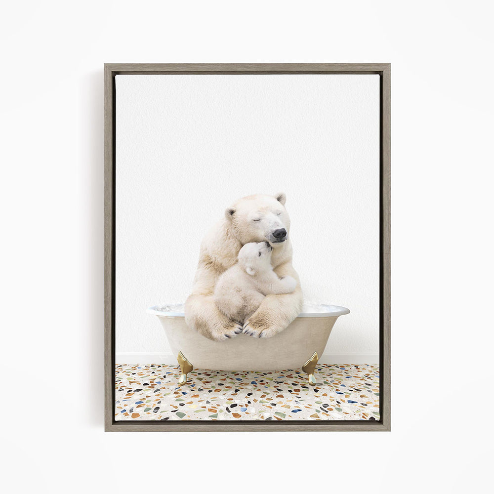 A polar bear and its cub sitting together in a bathtub, with the bear appearing to be hugging the cub.