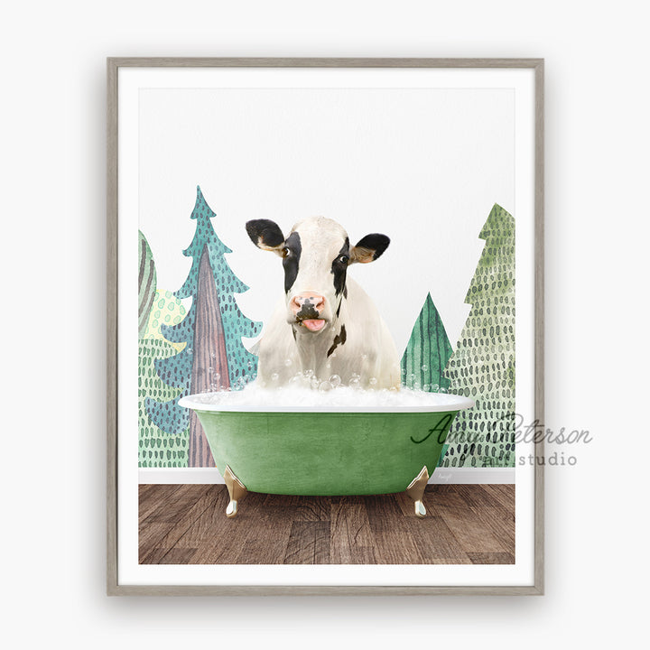 a cow sitting in a bathtub with trees in the background