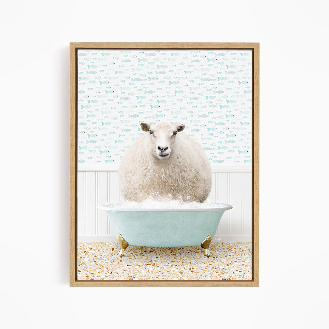 A fluffy white sheep sits in a blue bathtub filled with bubbles, surrounded by a patterned wall and a tiled floor.