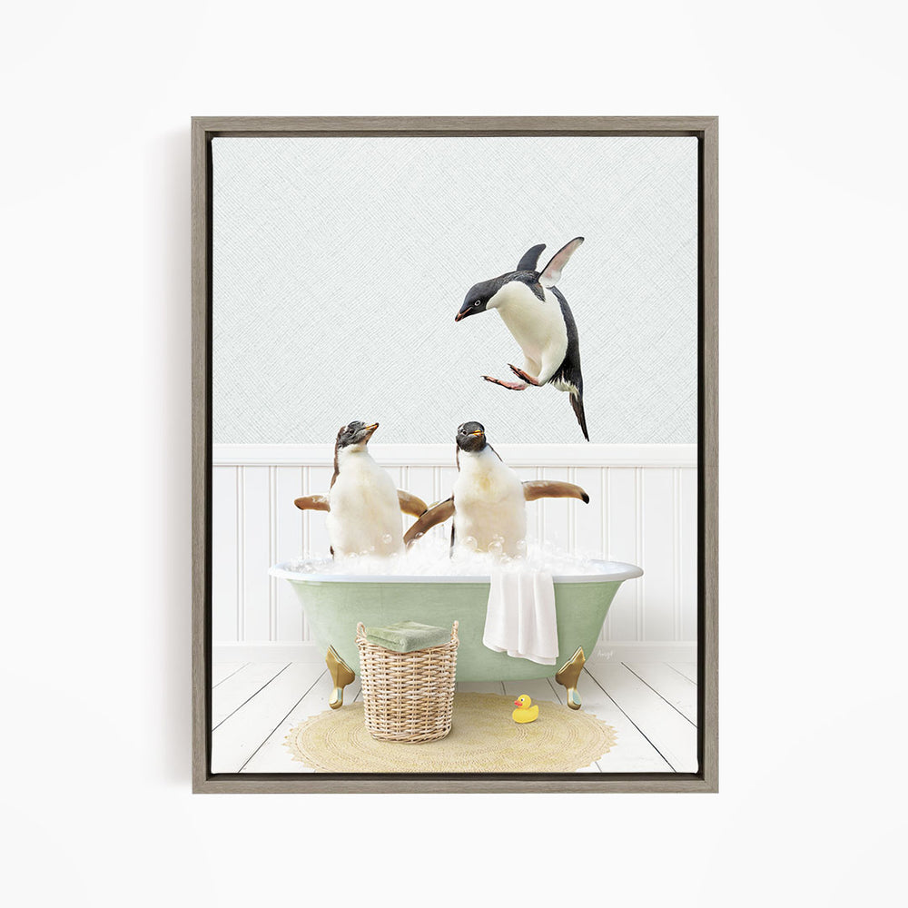 A framed image depicting two penguins sitting in a green bathtub, with one penguin flying towards the other.