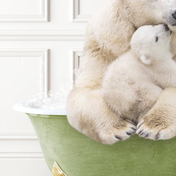 a mother polar bear and her cub cuddle in a tub of ice