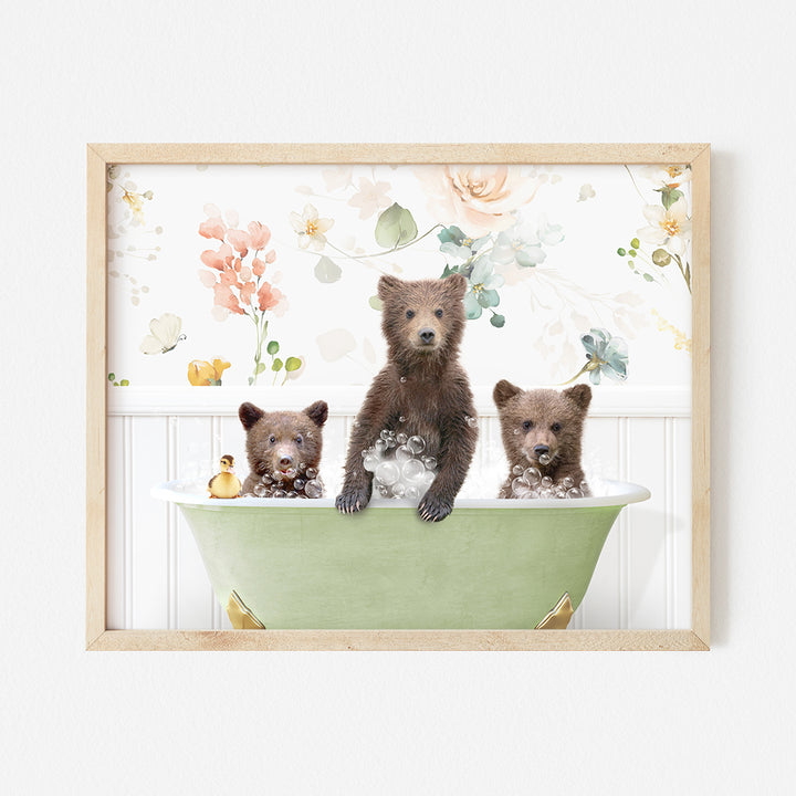 a group of bears sitting in a bath tub